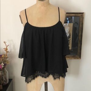Off shoulder top with lace hem